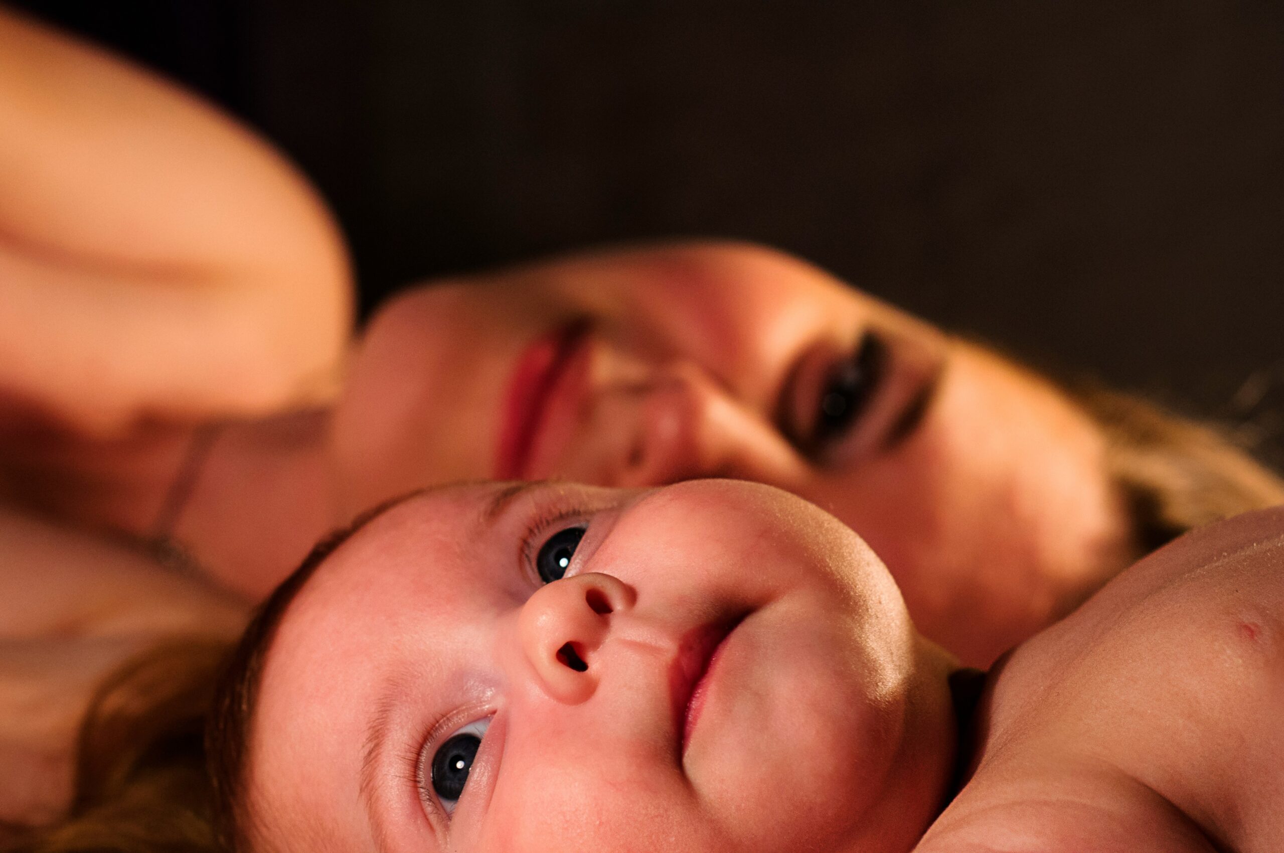 A close-up of a baby’s arm with a mild skin rash, showing red patches and irritation. The baby’s skin appears delicate and sensitive, highlighting the importance of proper care for common baby rashes.